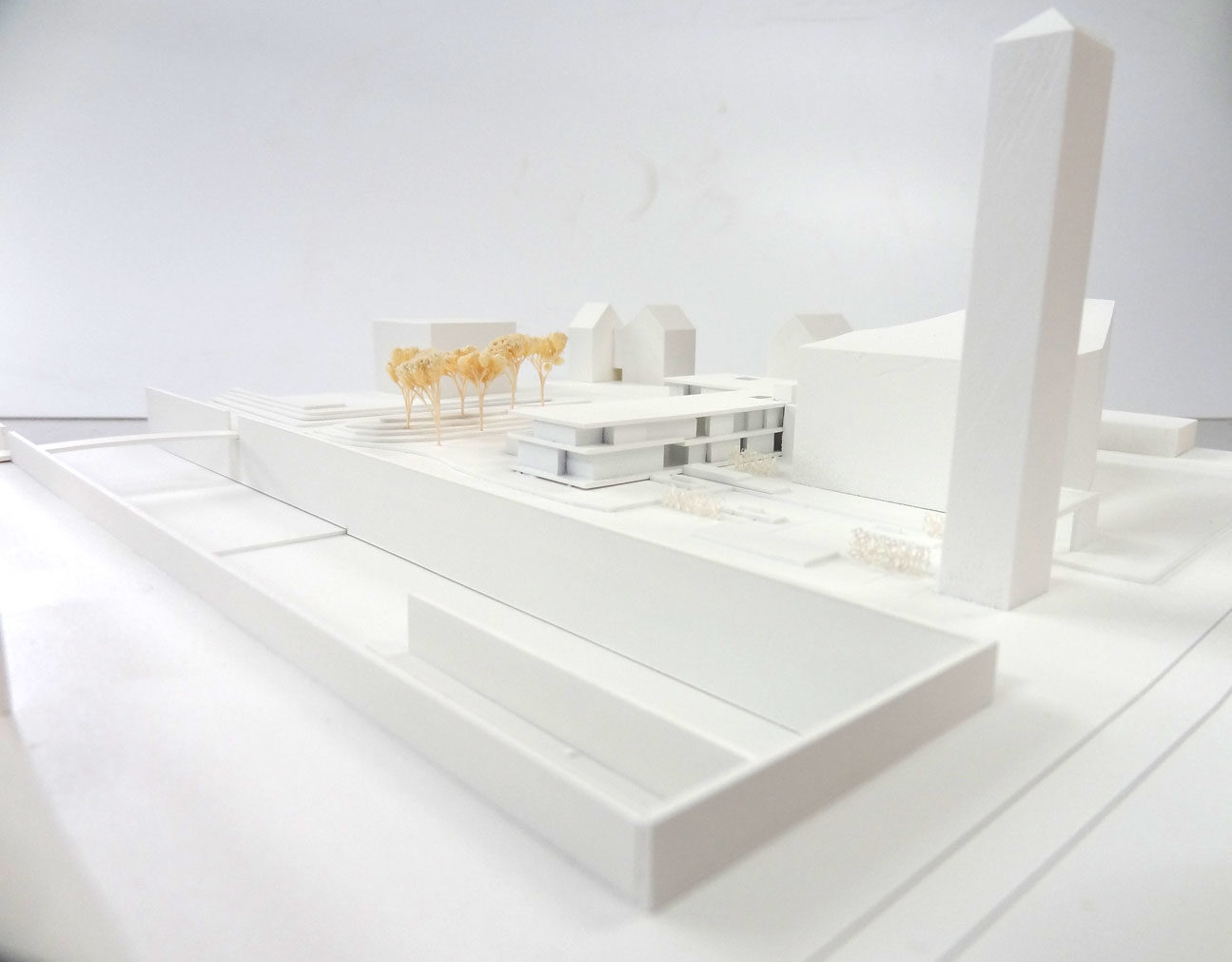 interprets the tension between city and religion in architecture